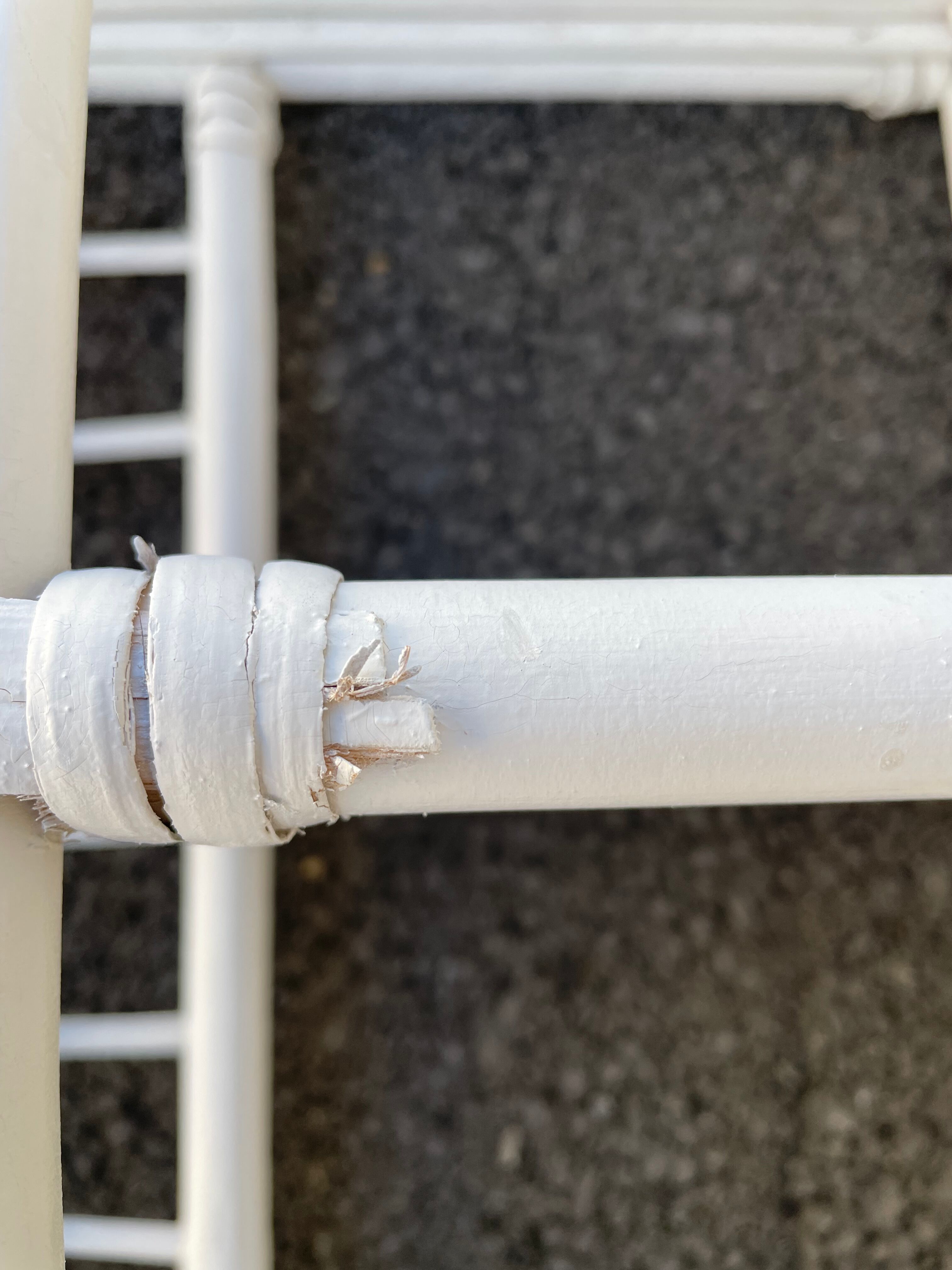 White rattan shelf with braces