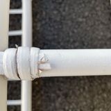 White rattan shelf with braces