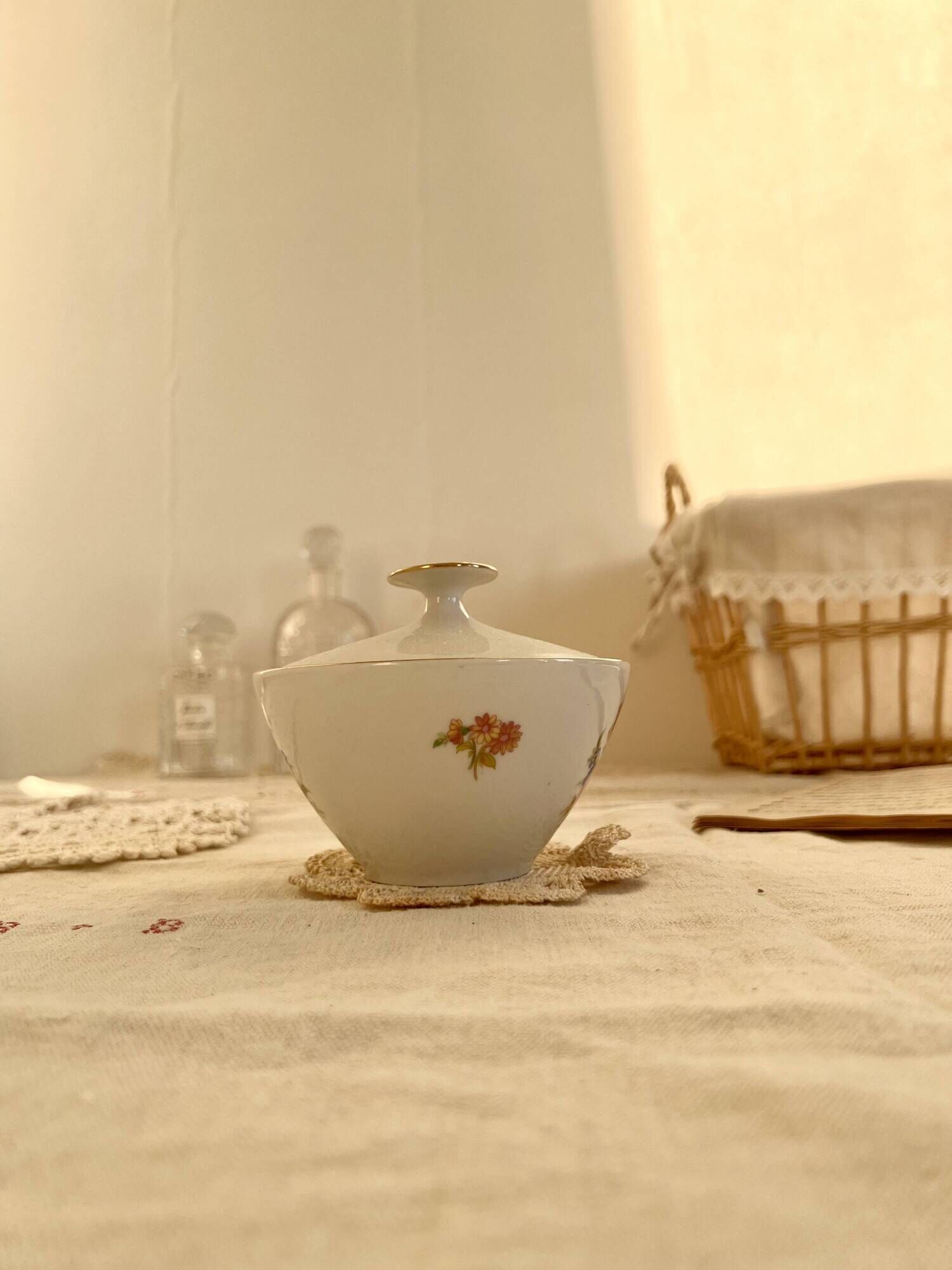 Vintage white porcelain sugar bowl and cottage core floral pattern