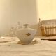 Vintage white porcelain sugar bowl and cottage core floral pattern