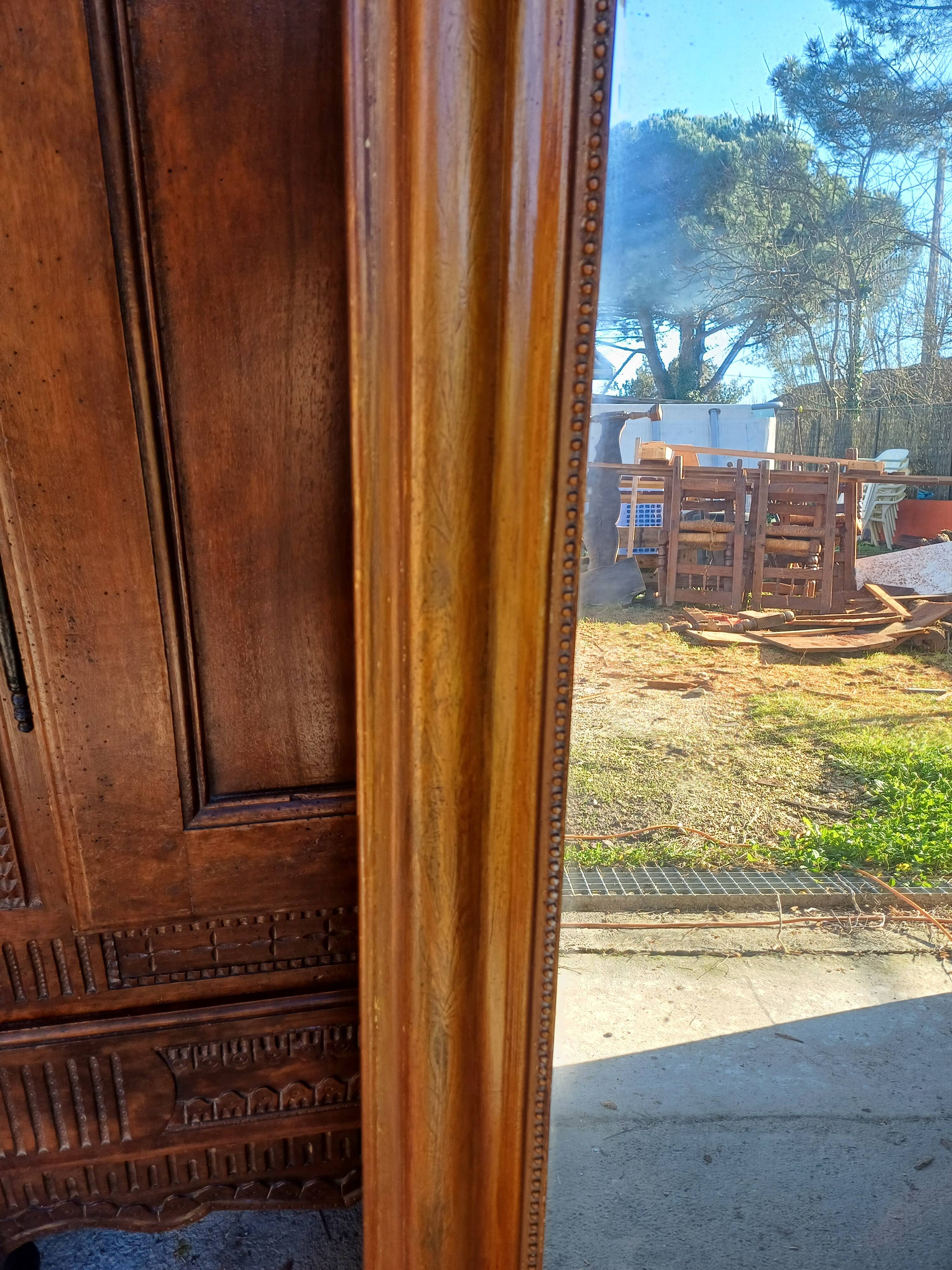 Napoleon III mirror in wood and gilded stucco