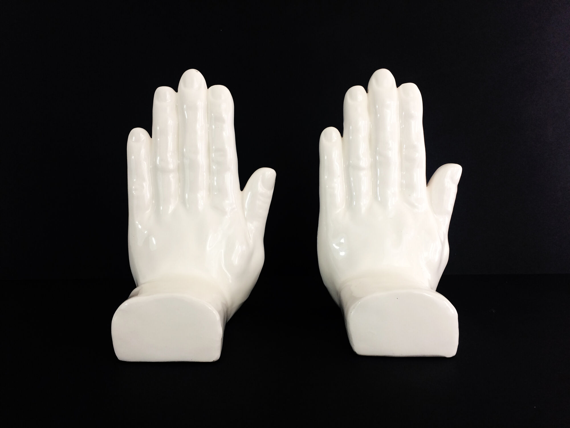 Pair of vintage handends in white ceramic to be used to comfort. Year 80