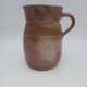 Pitcher in folk art sandstone