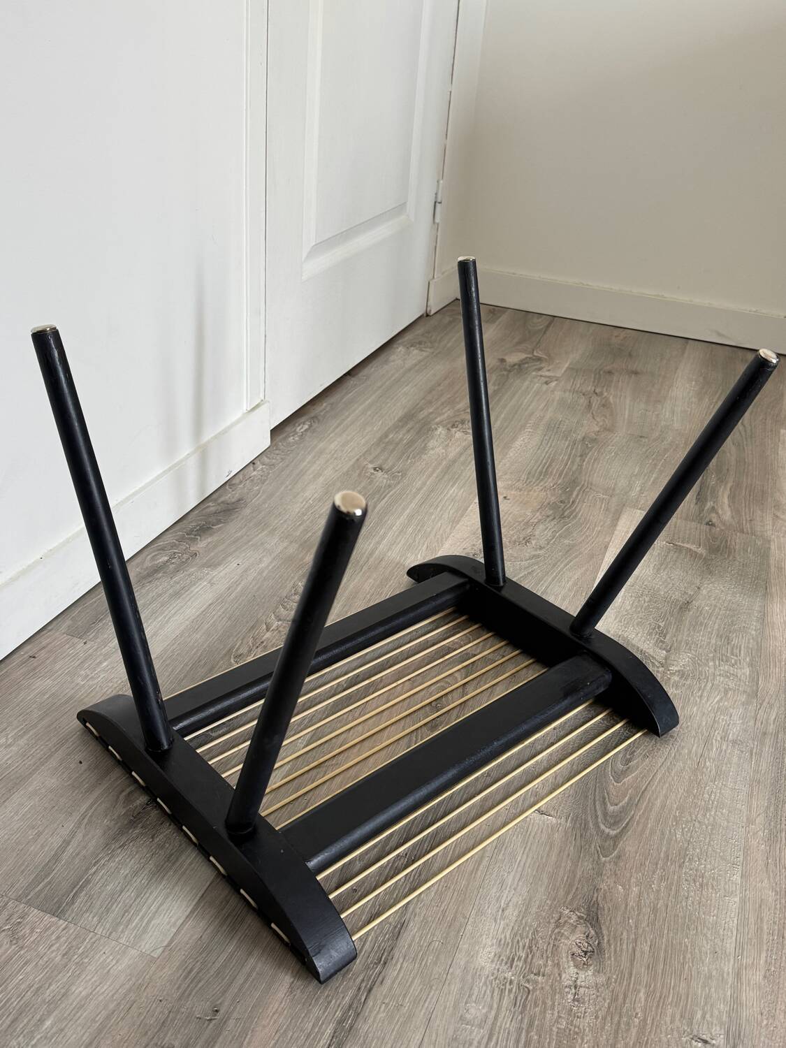 Vintage black Georges Tigien stool