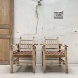 Pair of wooden armchairs and ropes