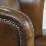 Sheep leather wingback chair with patina