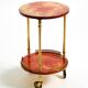 Round, small 1960s Aldo Tura serving or bar trolley in red goatskin leather