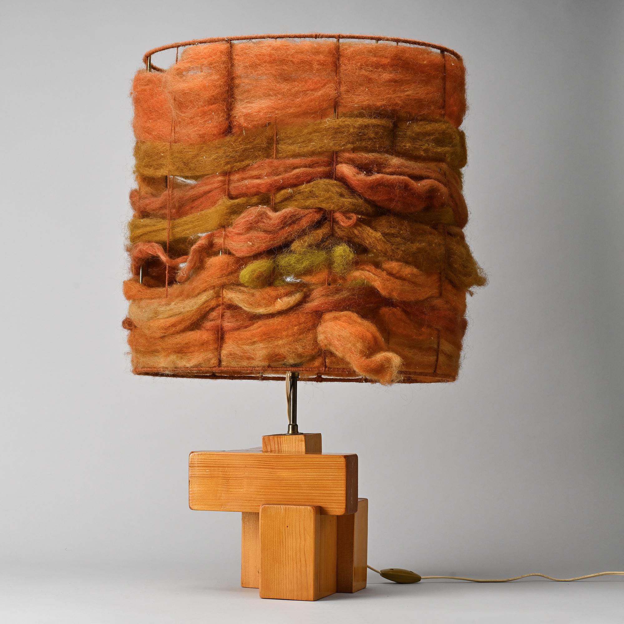 Sculptural table lamp in solid pine, France, circa 1970.