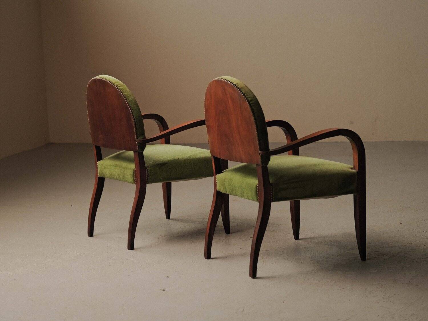 Pair of Art Deco armchairs in mahogany, circa 1930.