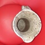 Ancient pitcher in speckled grey sandstone