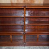 Antique pair of legal bookcases by William Baker Co in hardwood, satin and walnut.