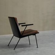 Modernist Dutch lounge chair in enamelled steel and leather from the 1950s.