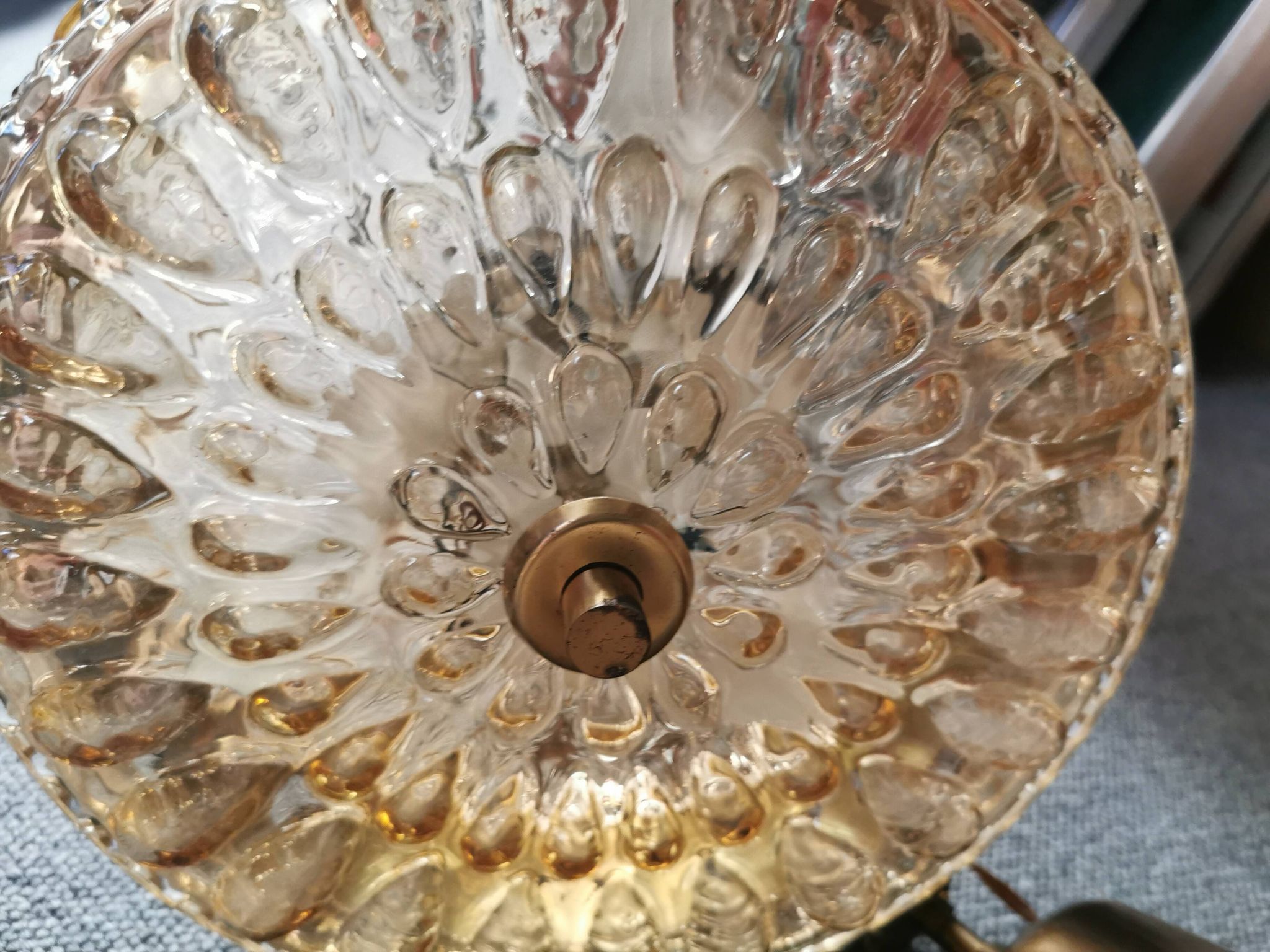 Ceiling-hanging lamp in glass with prisms and metal details