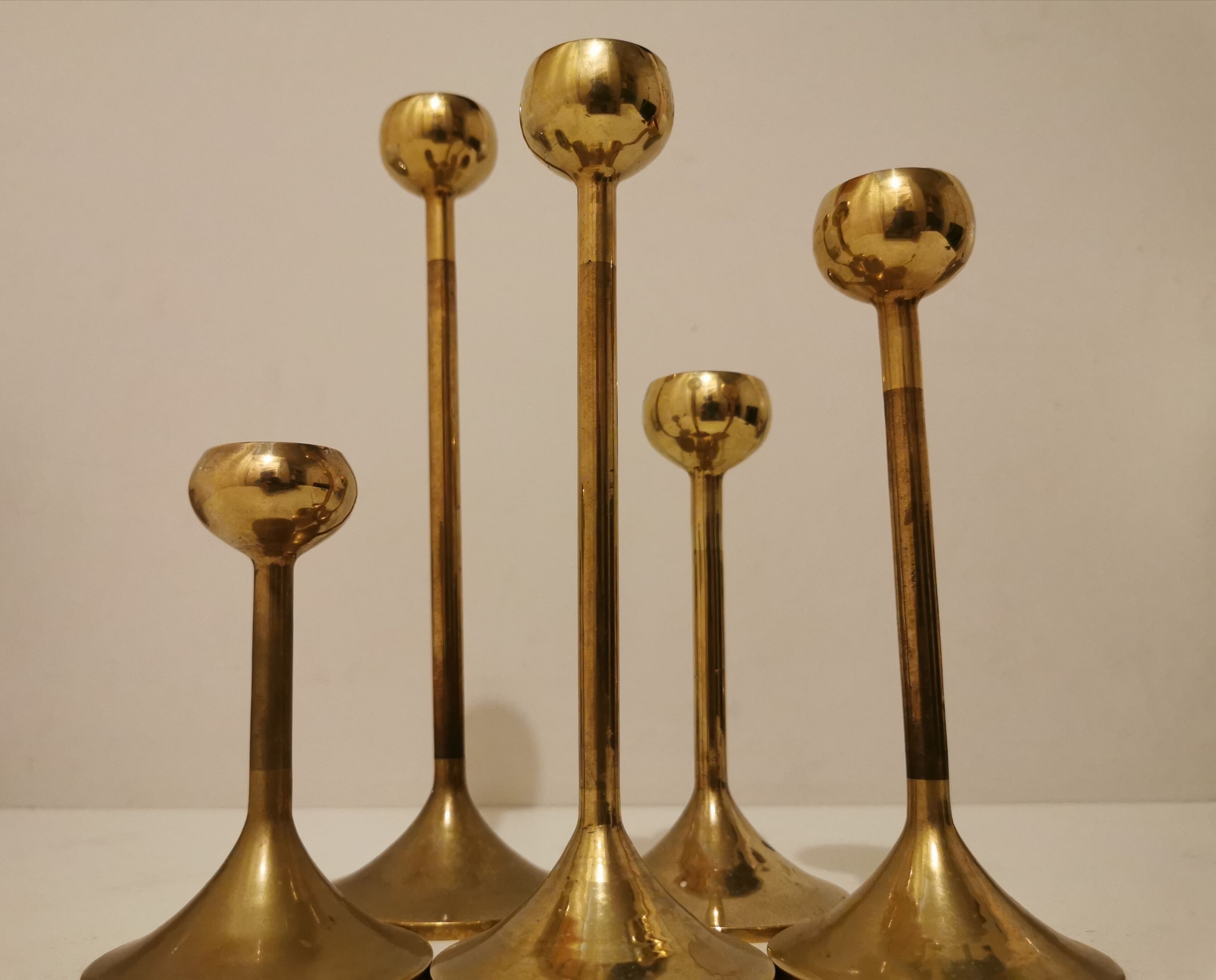 Set of 5 brass candlesticks from the 70s