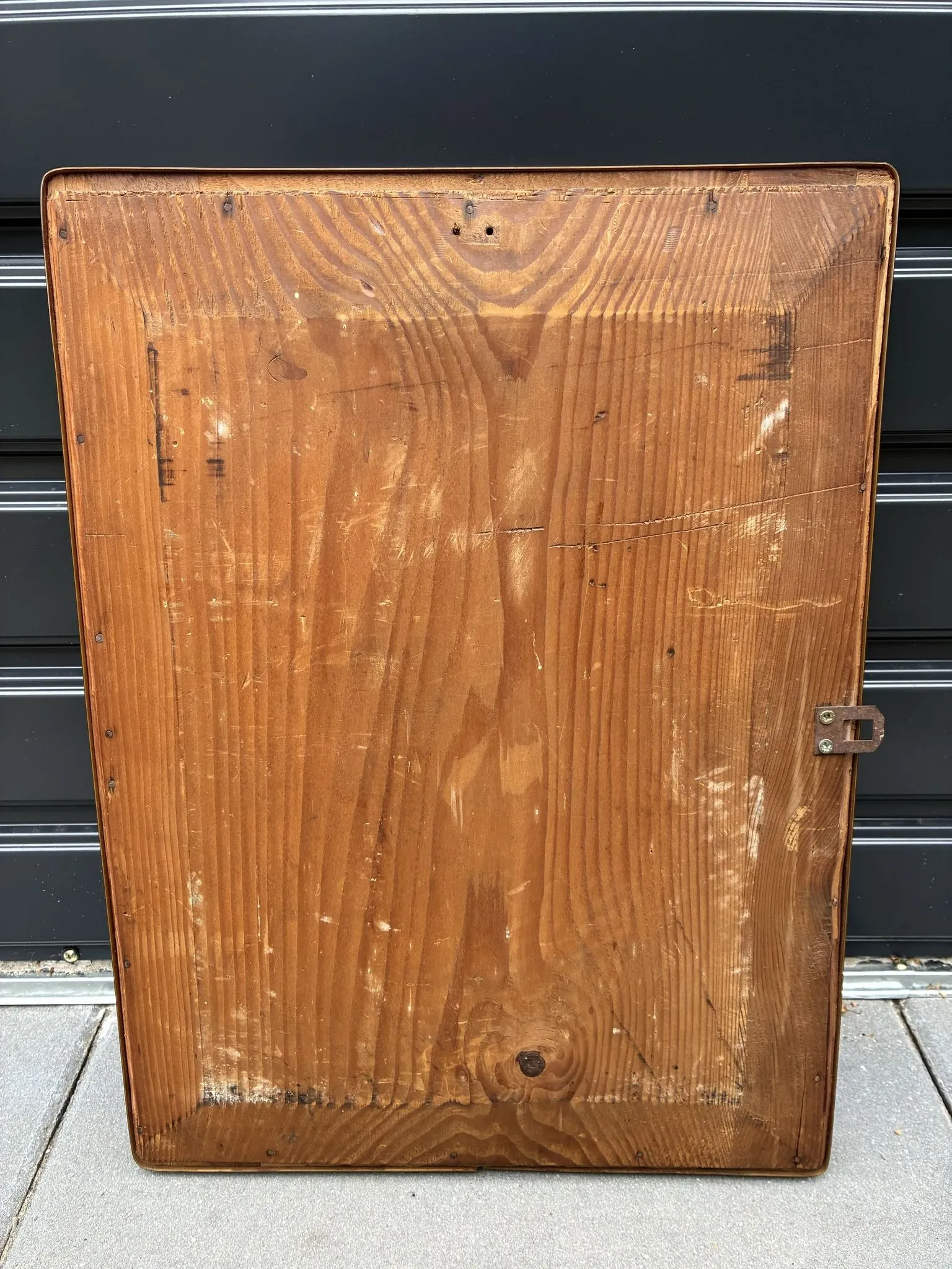 Mid-century organic shaped bevelled mirror in wooden frame, 1940s-50s