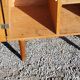 Vintage golden oak sideboard with conical legs from the 1950s