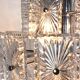 Vintage metal chandelier and carved glass