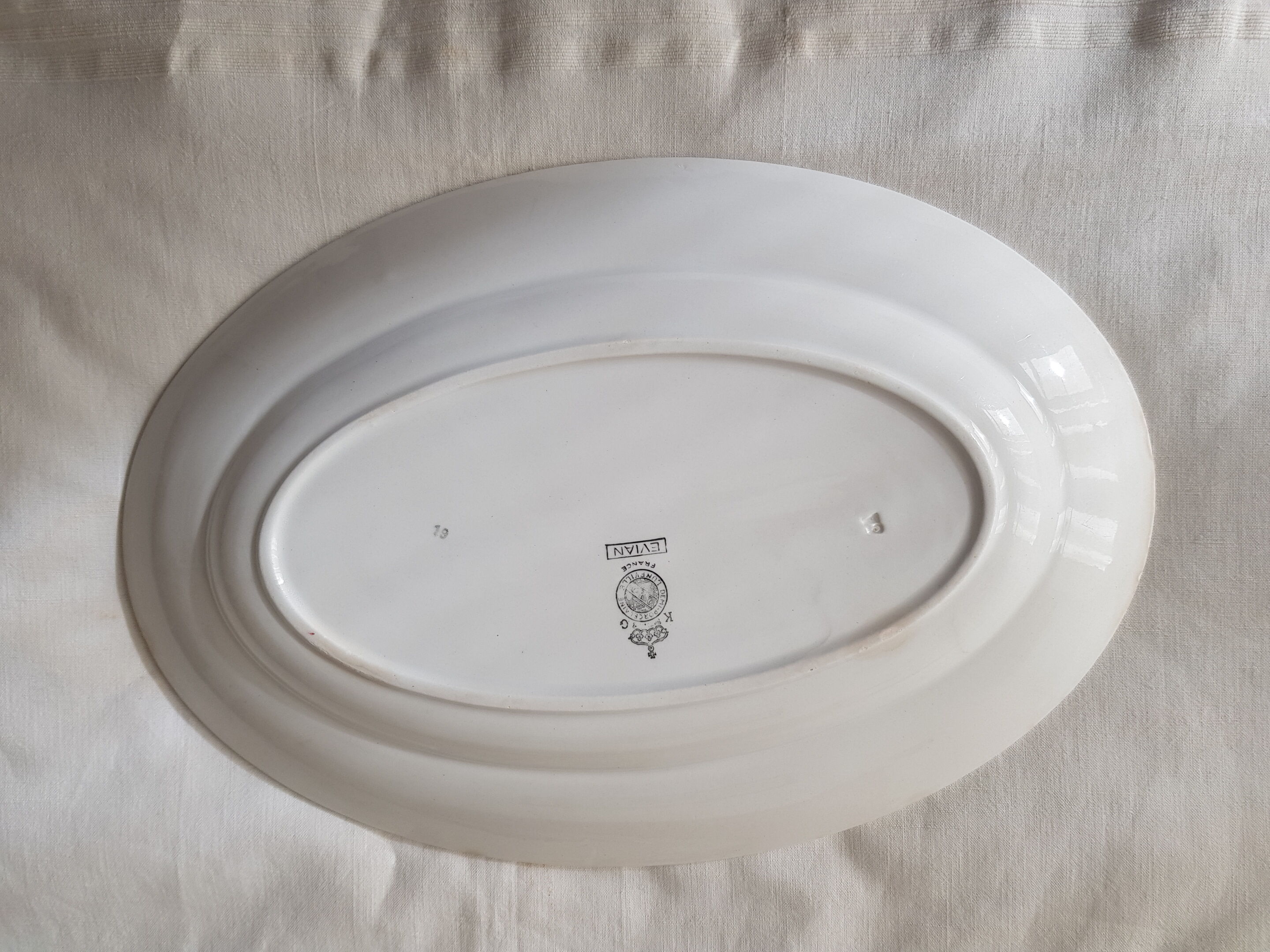 Old oval dish in luneville earthenware model evian floral decoration