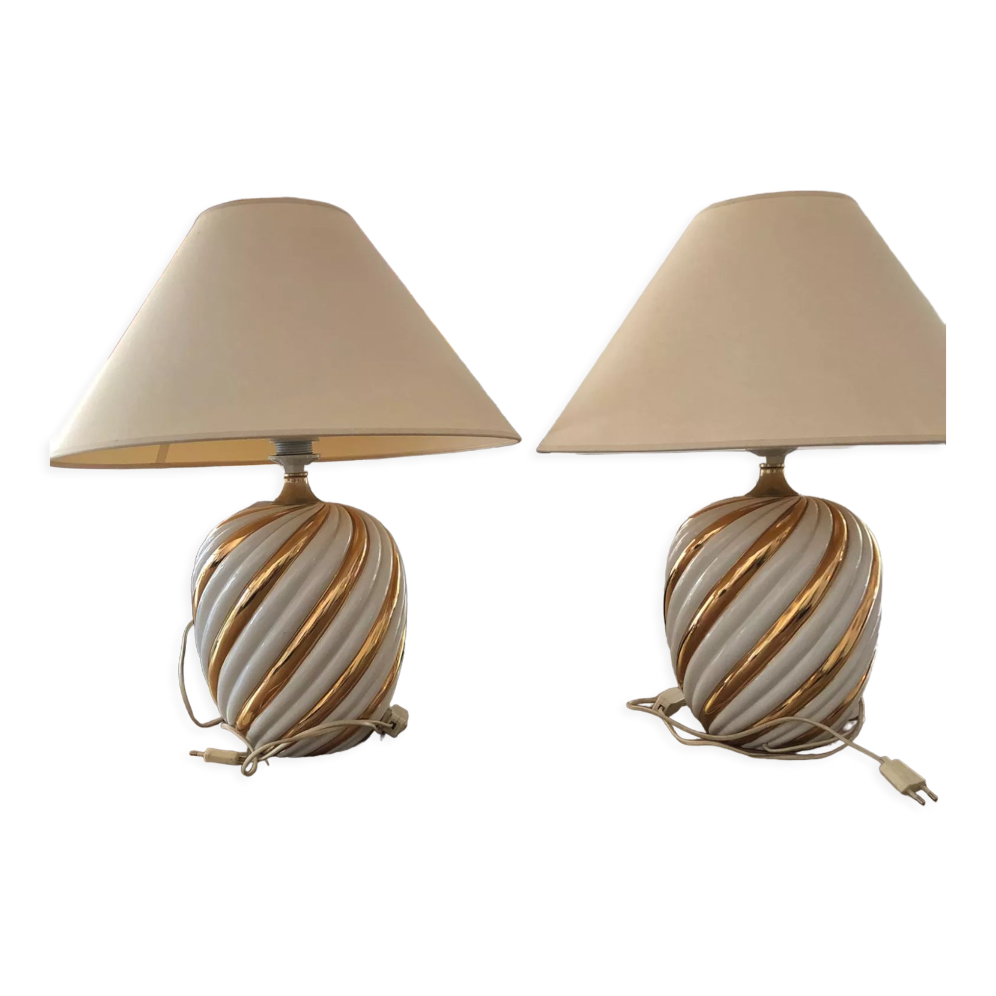 Pair of lamps of the brand Koska in white and twisted gold, with lampshade
