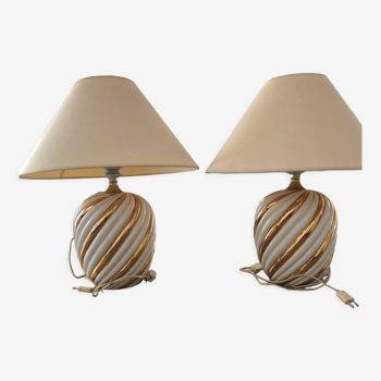 Pair of lamps of the brand Koska in white and twisted gold, with lampshade