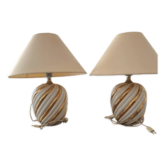 Pair of lamps of the brand Koska in white and twisted gold, with lampshade