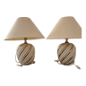 Pair of lamps of the brand Koska in white and twisted gold, with lampshade