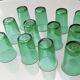 12 vintage Lesieur green glasses.