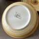 Lot de 4 assiettes creuses signées Longchamp
