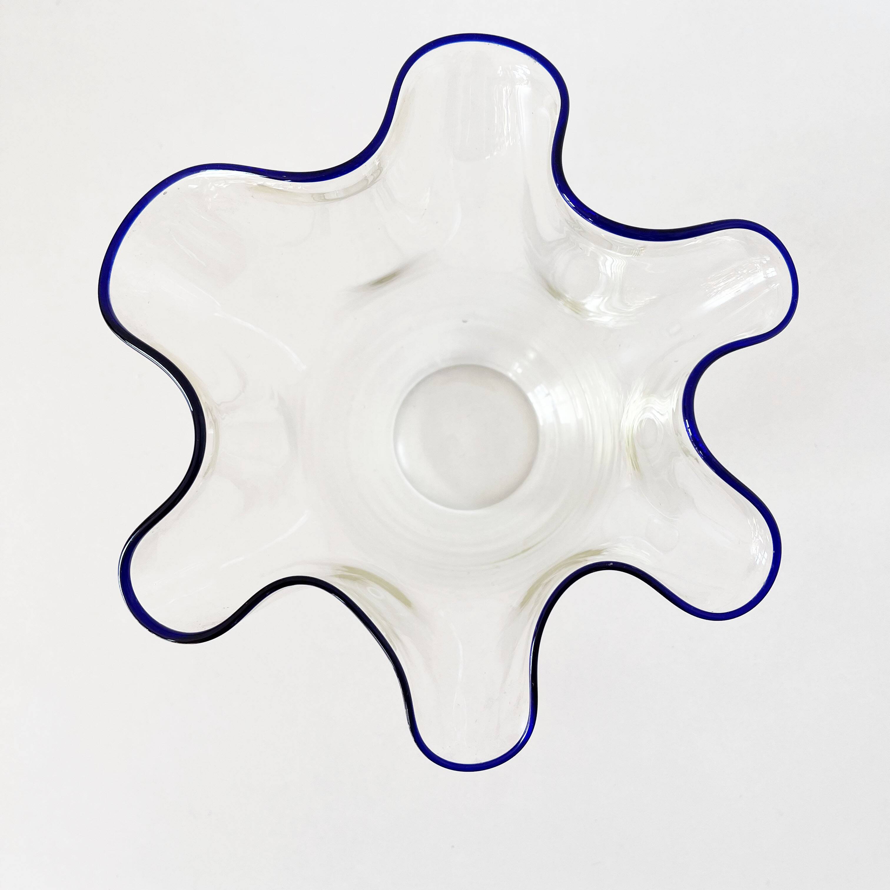 Blue-edged blown glass handkerchief vase