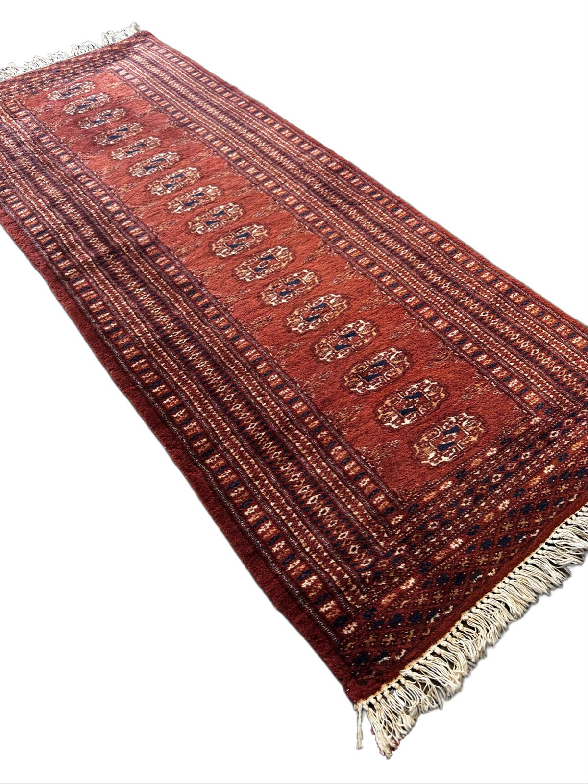Handmade oriental hallway rug, 180cm x 70cm.