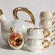 Fruit-shaped liqueur service in porcelain or tea set with its mirror tray.