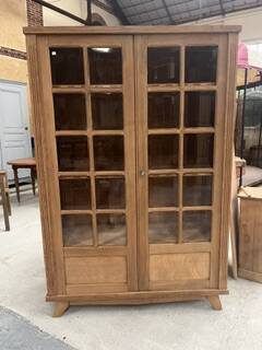 oak two-door display cabinet