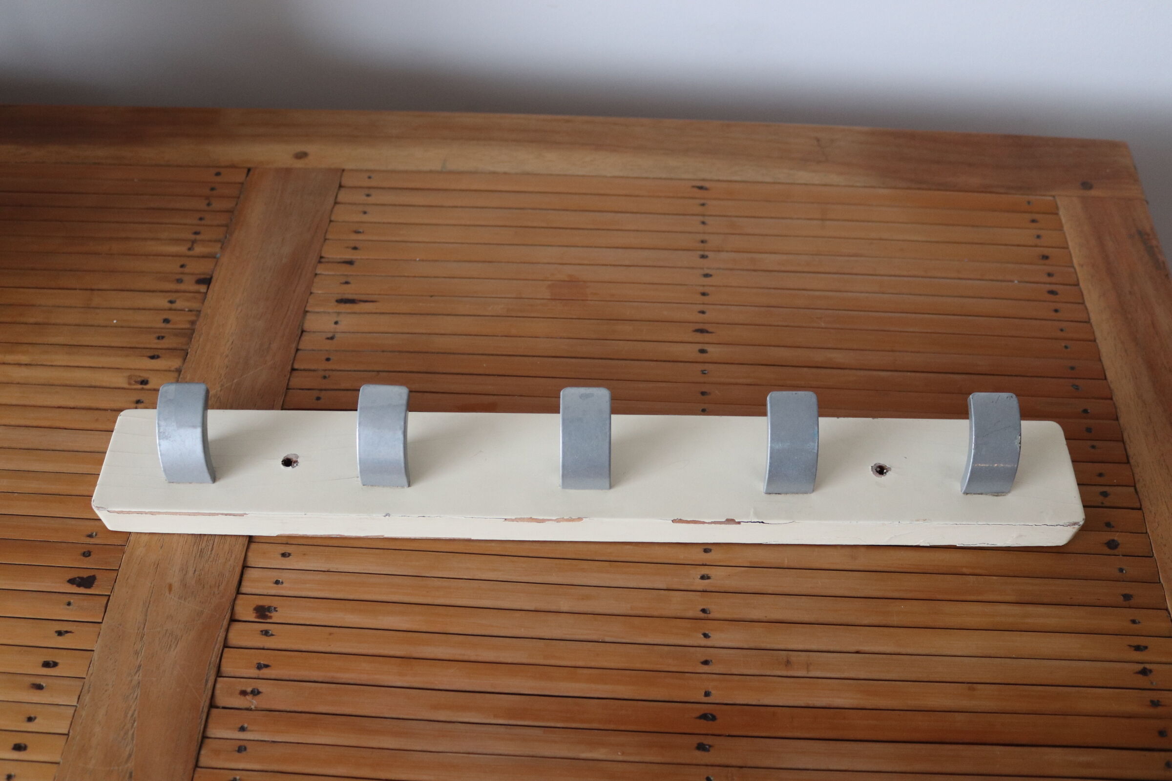 Patinated wood and metal hook