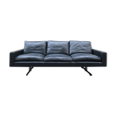 Leather sofa of the 70s footing in chrome