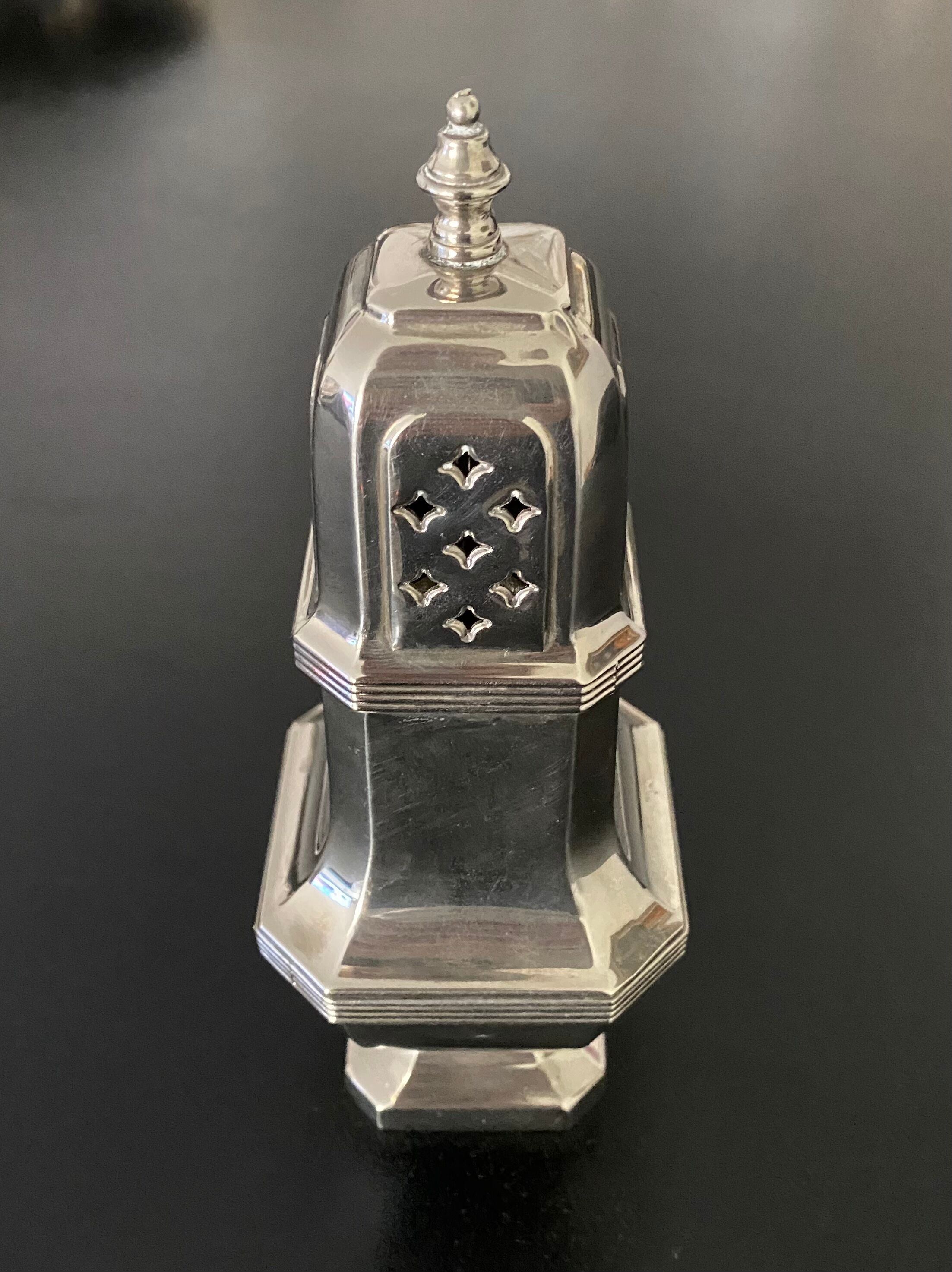 1 silver metal sprinkler