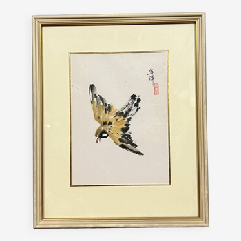 Asie 1900 : aquarelle encadrée et signée figurant un oiseau en vol