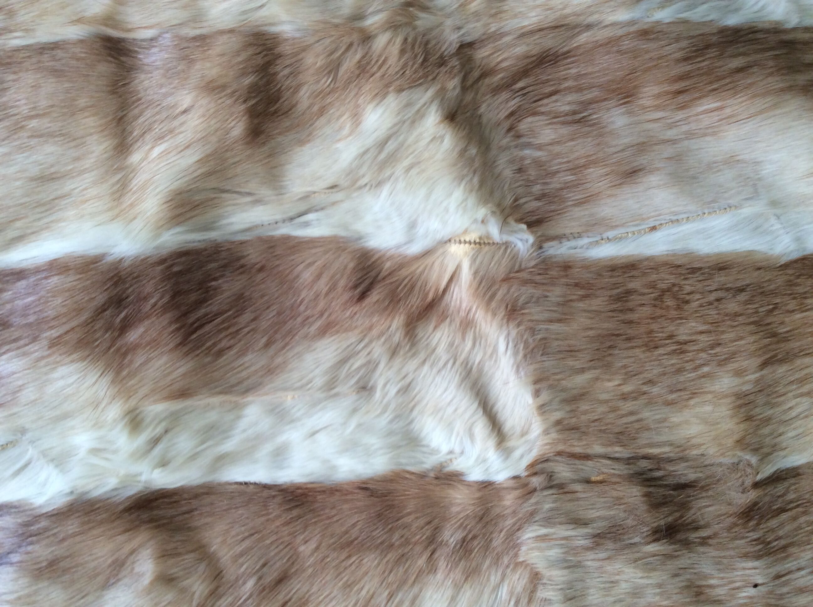 Rabbit skin rug, 200x225cm.
