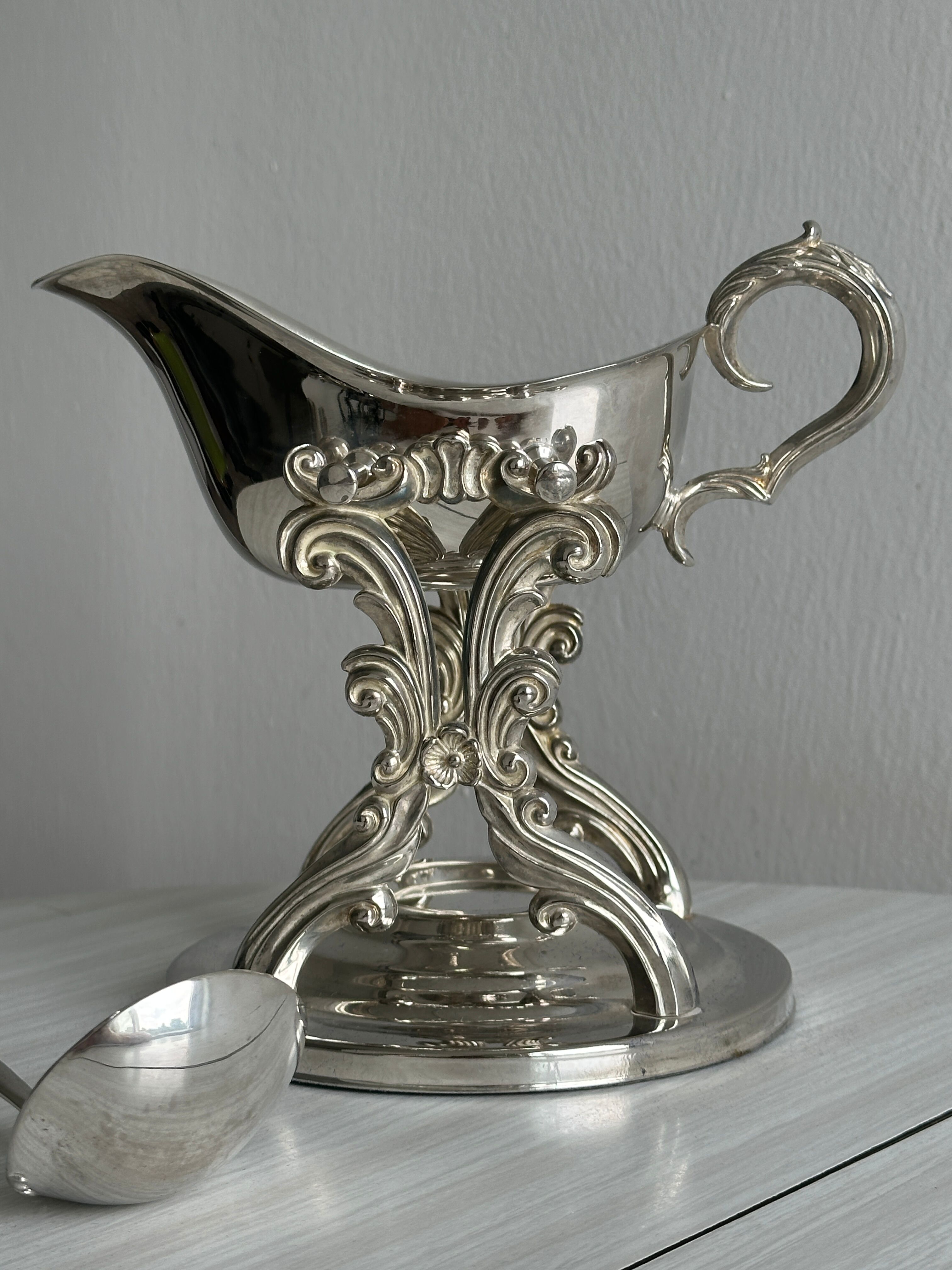 antique metal sauceboat with candle warmer and ladle