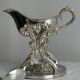 antique metal sauceboat with candle warmer and ladle