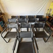 Set of 12 vintage black leather and tubular steel chairs – Italy, year