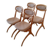 Four Scandinavian-style chairs