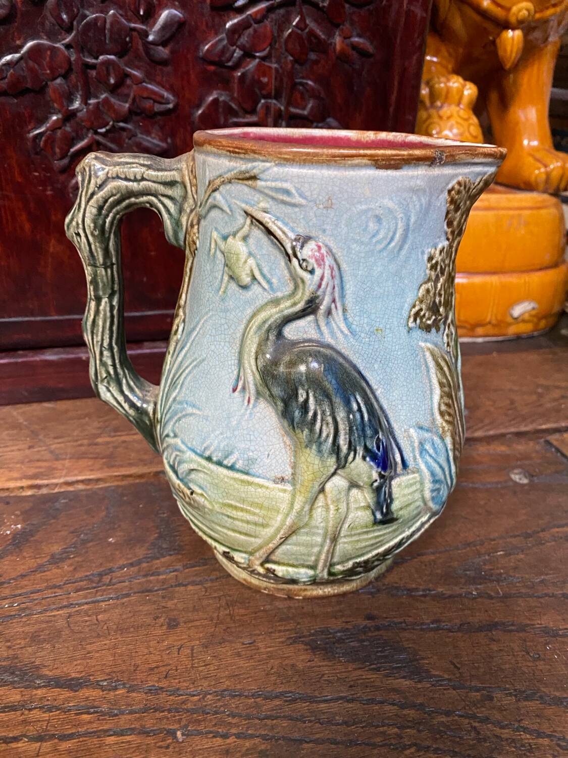 Majolica pitcher depicting a heron, 1900