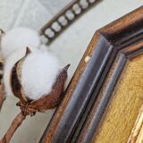 Antique mirror in black and gold octagonal wood