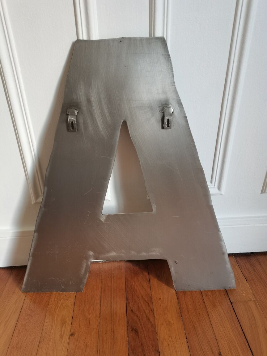 Industrial style letter in metal