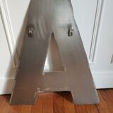 Industrial style letter in metal