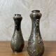 Pair of bronze vases - Asian motifs in relief in copper