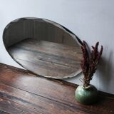 Old oval beveled art deco mirror