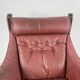 Vintage winged leather high backed Falcon chair designed by Sigurd Resell