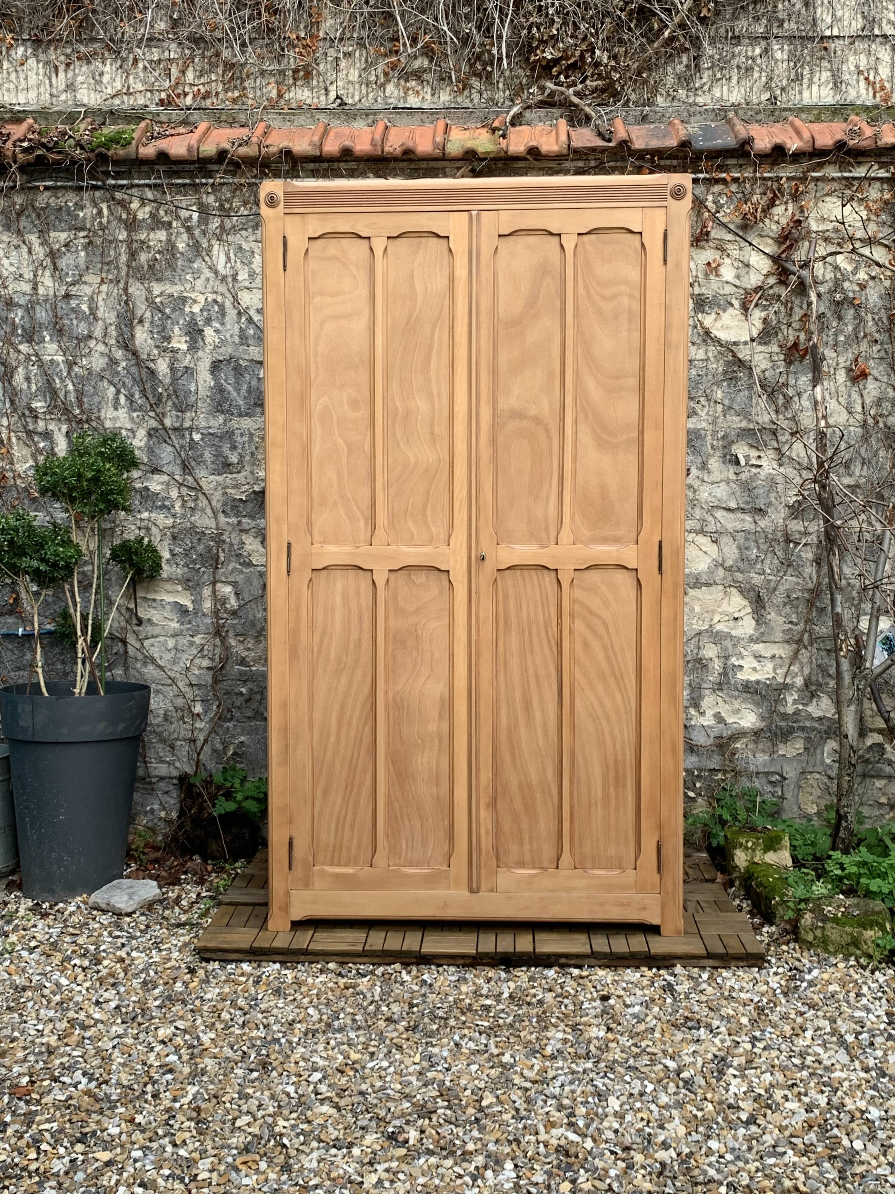 Parisian paneled cabinet in raw wood, 1940