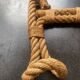 vintage wall coat rack in braided rope